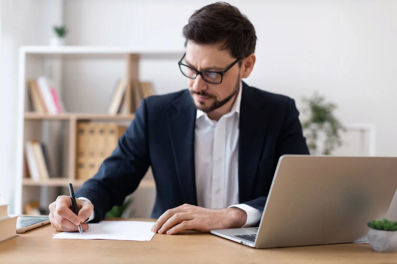 A business owner reviews his insurance deductible.