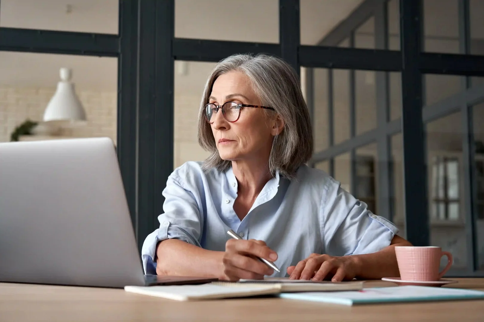 A business owner reviews her insurance policy to check whether she has a claims made vs occurrence policy.